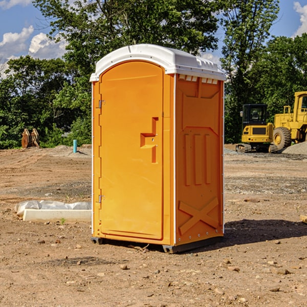 what is the cost difference between standard and deluxe portable restroom rentals in Woodhull Illinois